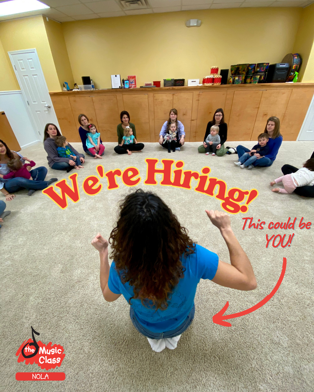 The Music Class teacher sharing a song with young children and their caregivers