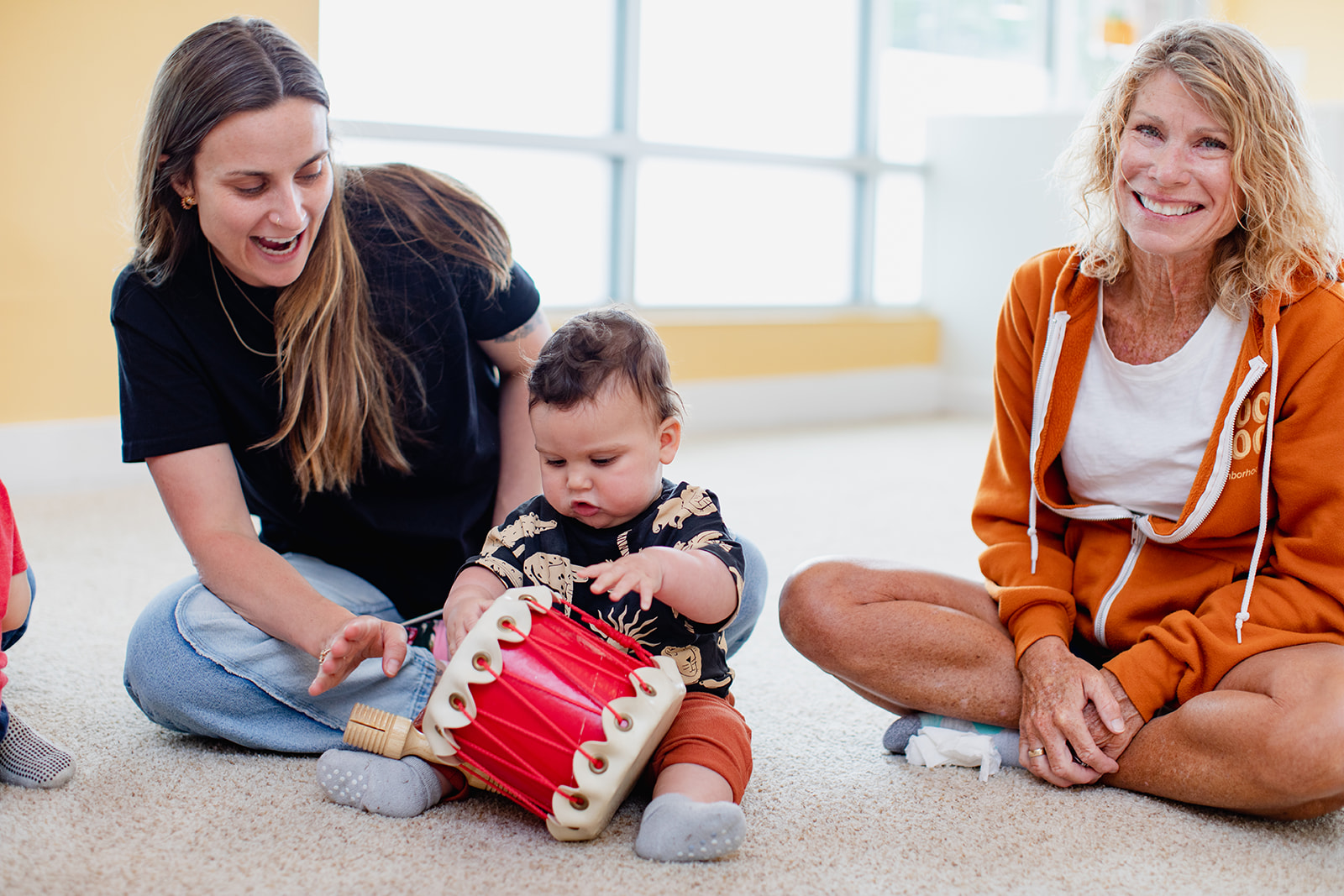 mom, grandma, and baby all having a blast at The Music Class!