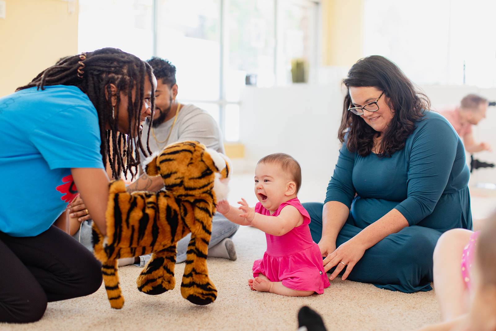 Babies love the puppet songs in Music Class!