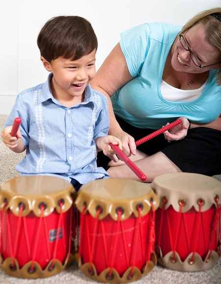 Boy with three drums